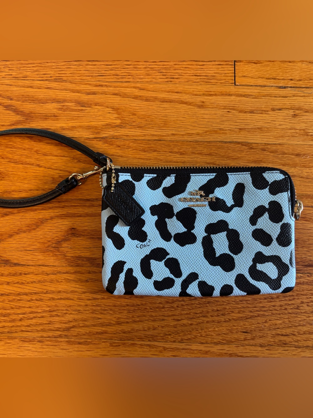 Coach Light Blue and Black Leopard Print Wristlet